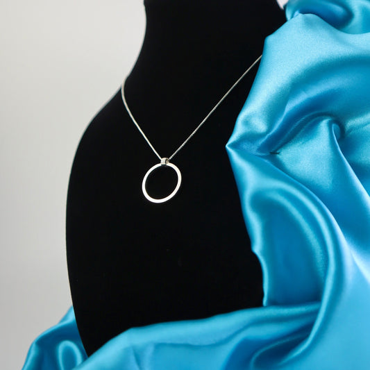 handmade minimalist sterling silver hoop necklace on a dainty chain