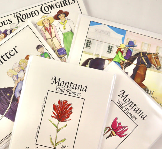 western style greeting cards with cowgirls and Montana wildflowers