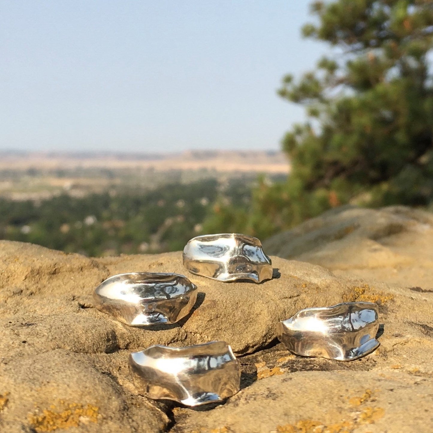 handmade sterling silver ring inspired by the shape of flower petals